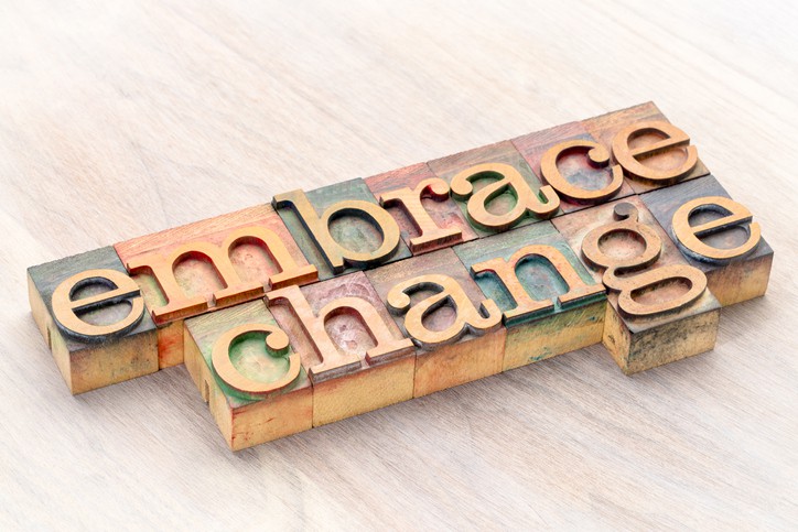 embrace change word abstract in letterprtess wood type blocks stained by color inks